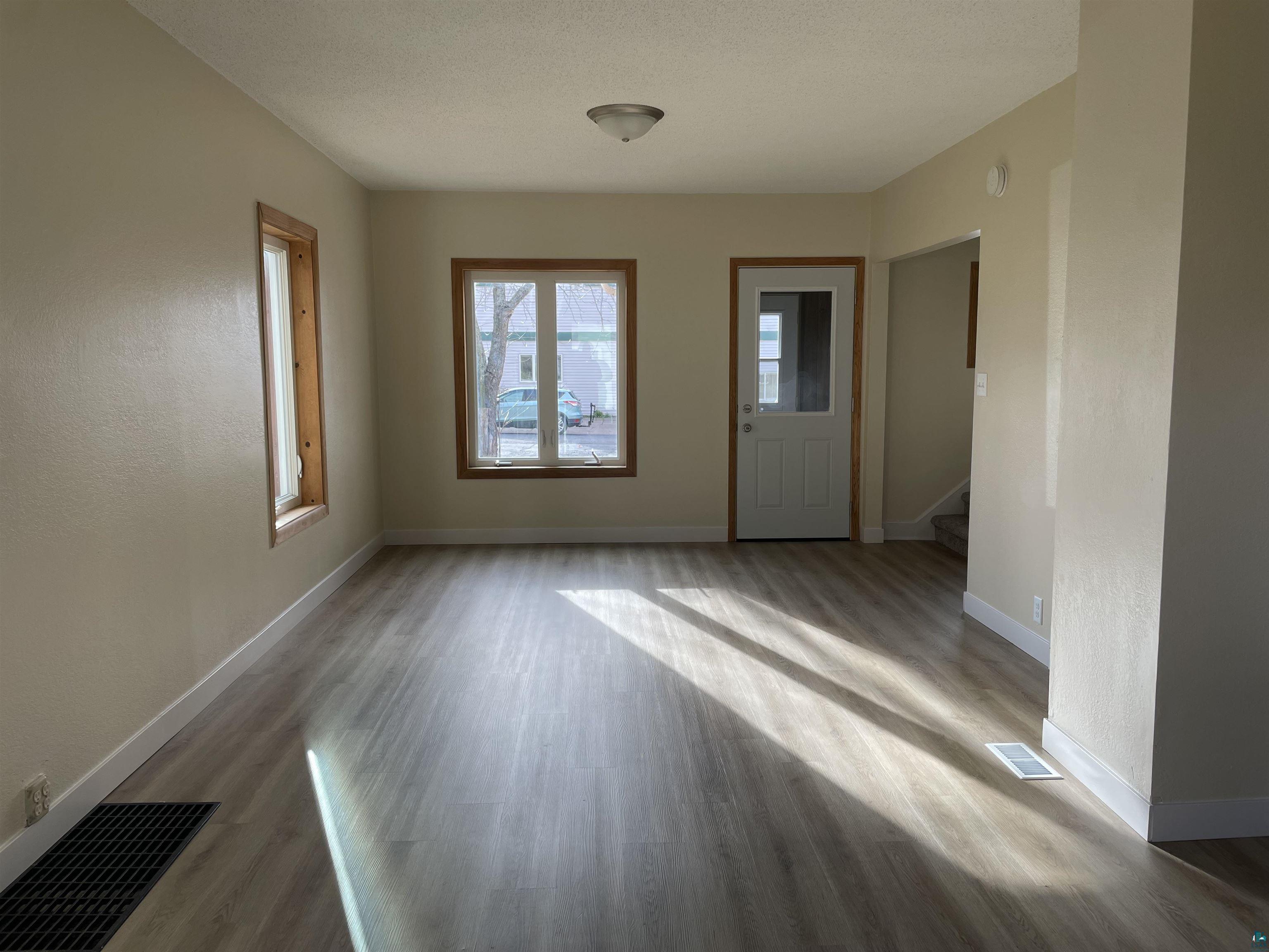 219 4th Street Proctor, MN 55810 - Photo 8 of 25 Entrance foyer with wood-type flooring