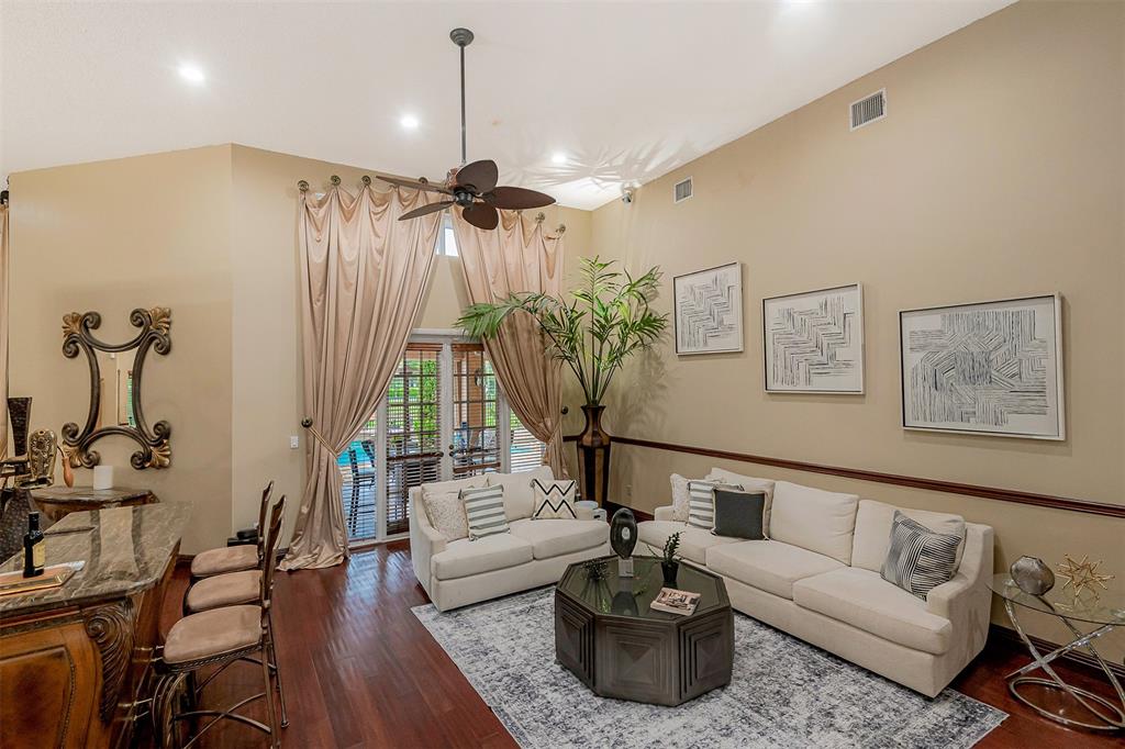 Davie Davie, FL 33330 - Photo 17 of 57 a living room with furniture and a chandelier