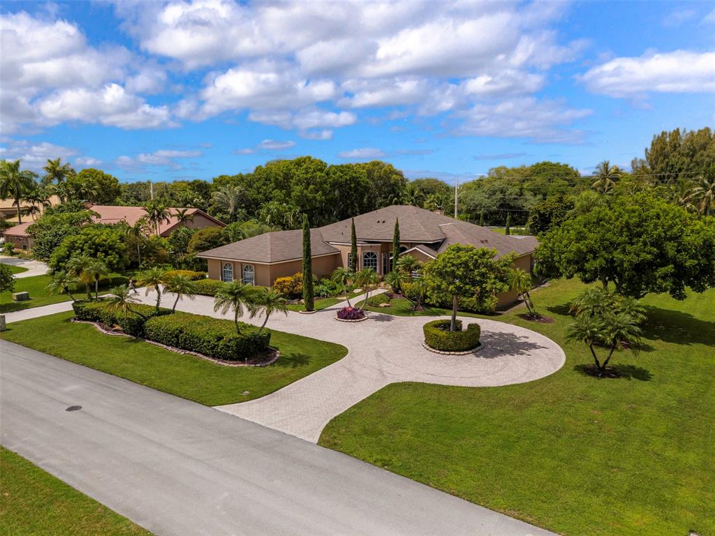 Davie Davie, FL 33330 - Photo 2 of 57 a view of a garden with lawn chairs