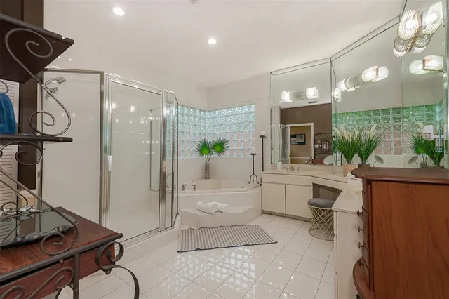 a bedroom with a bed and a shower