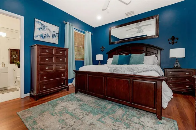 a bed room with a bed and a window