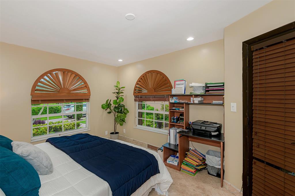 Davie Davie, FL 33330 - Photo 28 of 57 a bedroom with a bed and a window