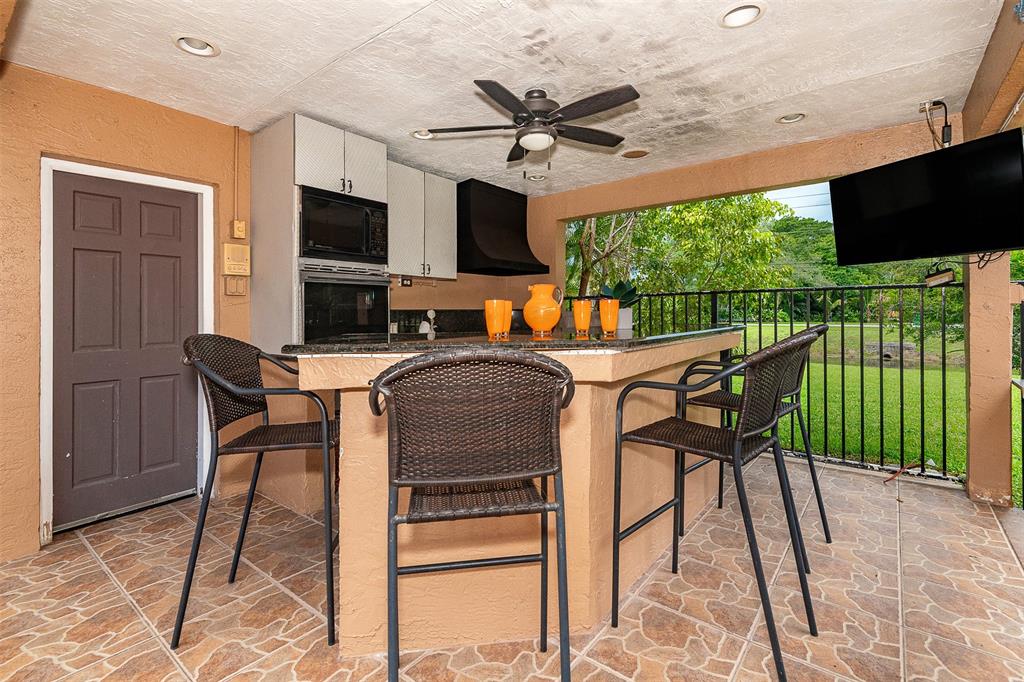 Davie Davie, FL 33330 - Photo 35 of 57 a dinning area with a table and chairs in it