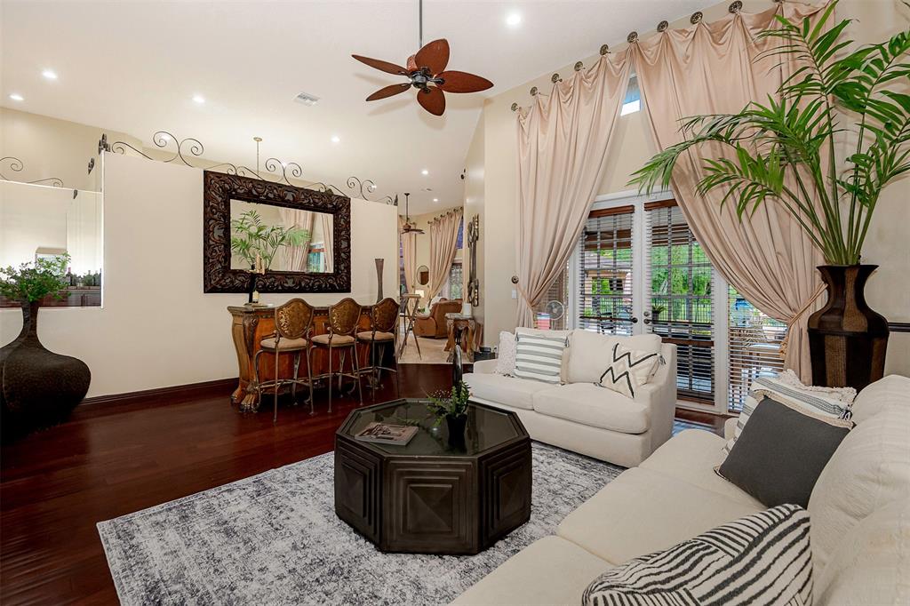 Davie Davie, FL 33330 - Photo 40 of 57 a living room with furniture a large window and a flat screen tv
