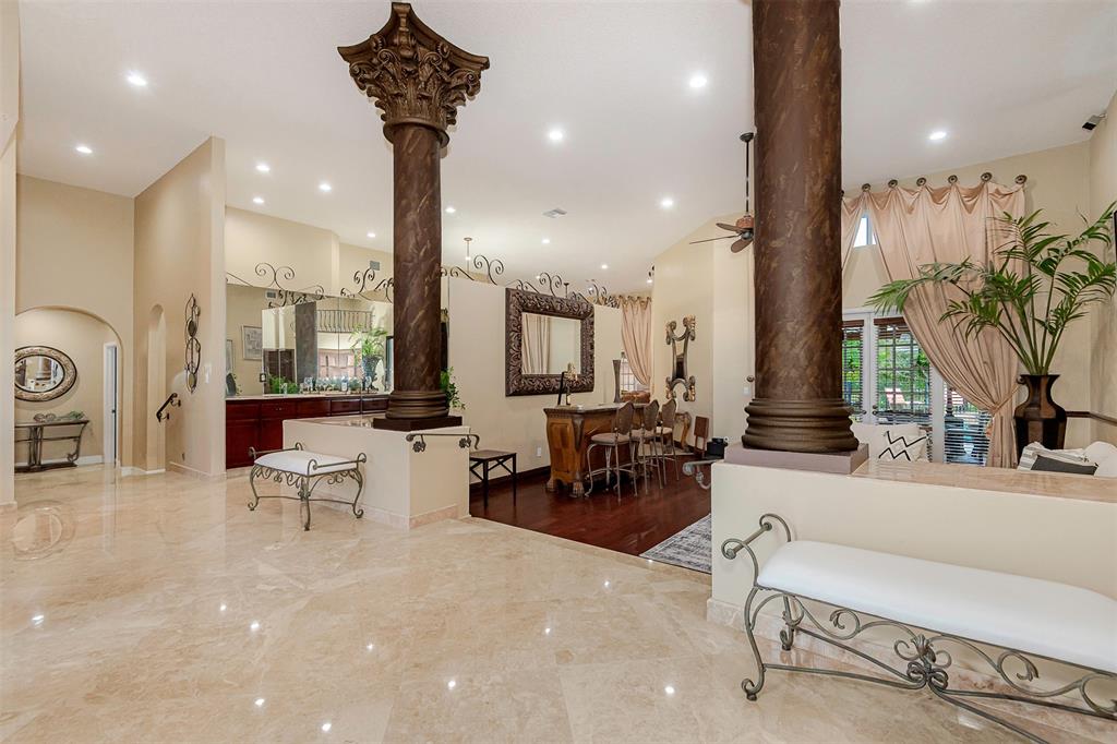Davie Davie, FL 33330 - Photo 41 of 57 a living room with furniture and a chandelier