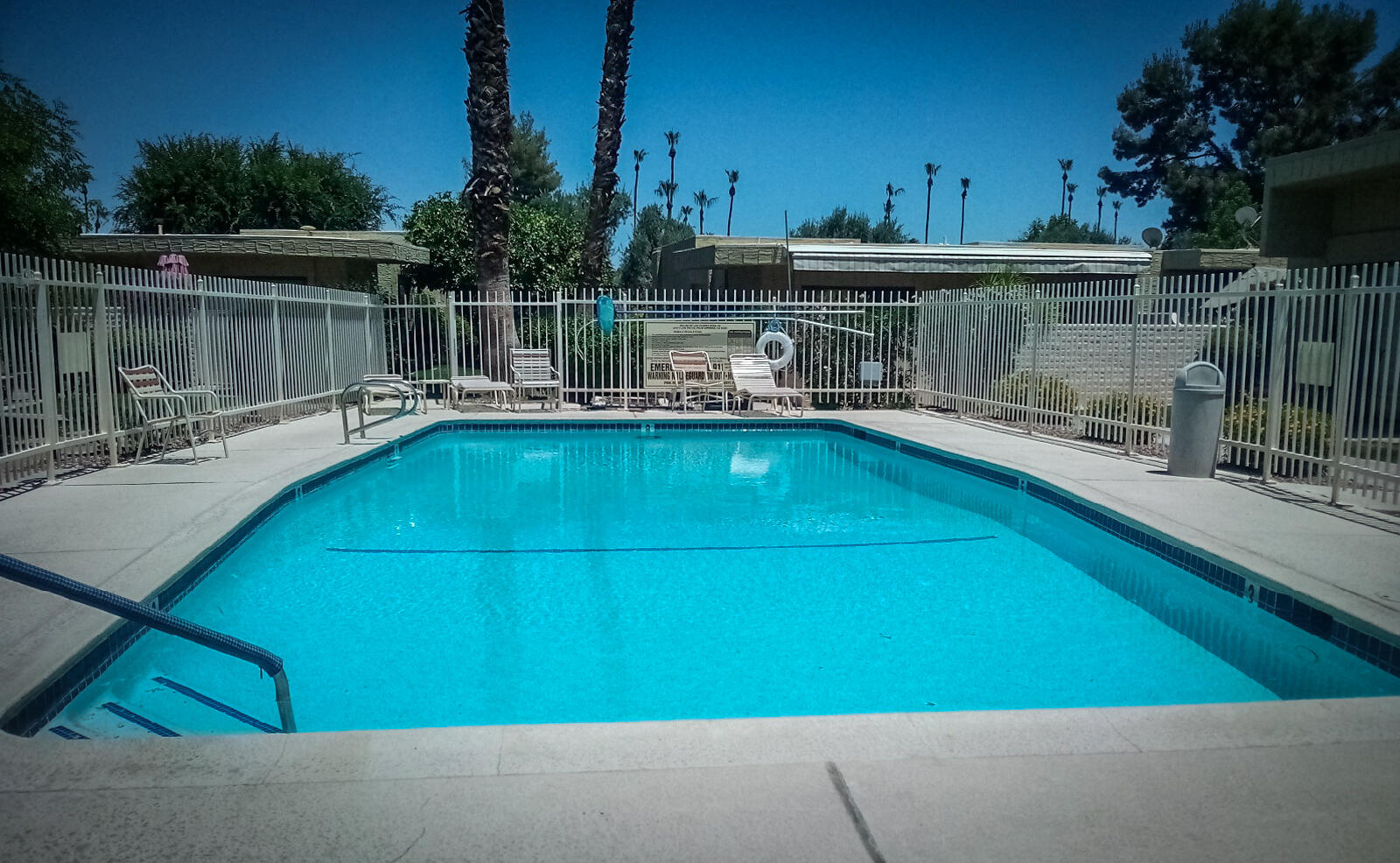 2415 Los Patos Drive Palm Springs, CA 92264 - Photo 16 of 17 a view of a swimming pool with a patio