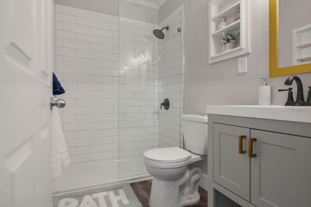 1917 Spring Avenue Atlanta, GA 30344 - Photo 16 of 22 a bathroom with a toilet sink and shower
