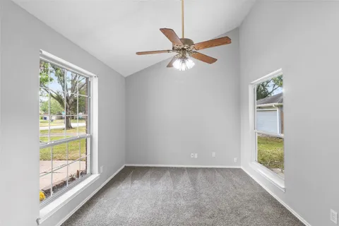 a view of an empty room and window