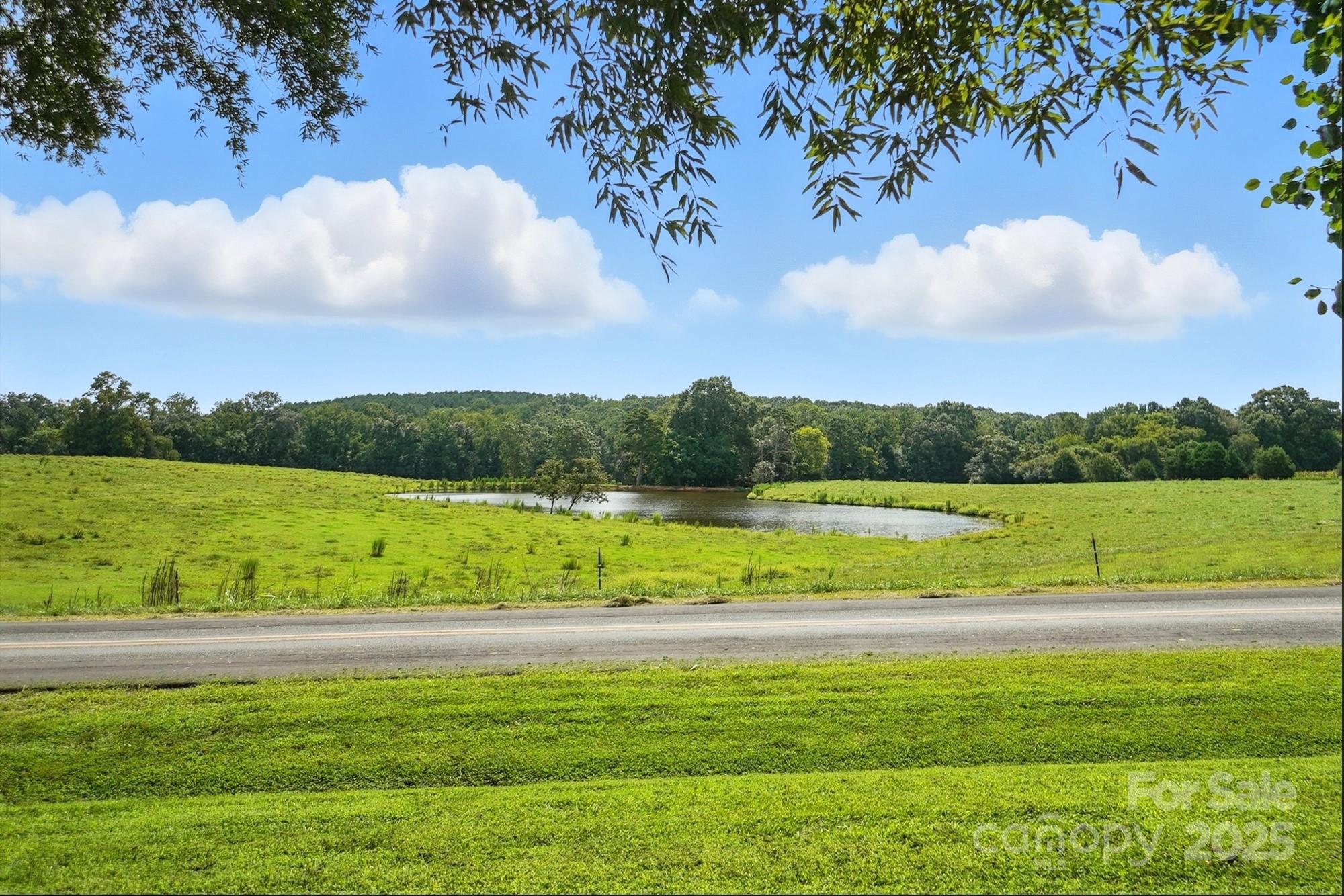 a view of a golf course with a lake
