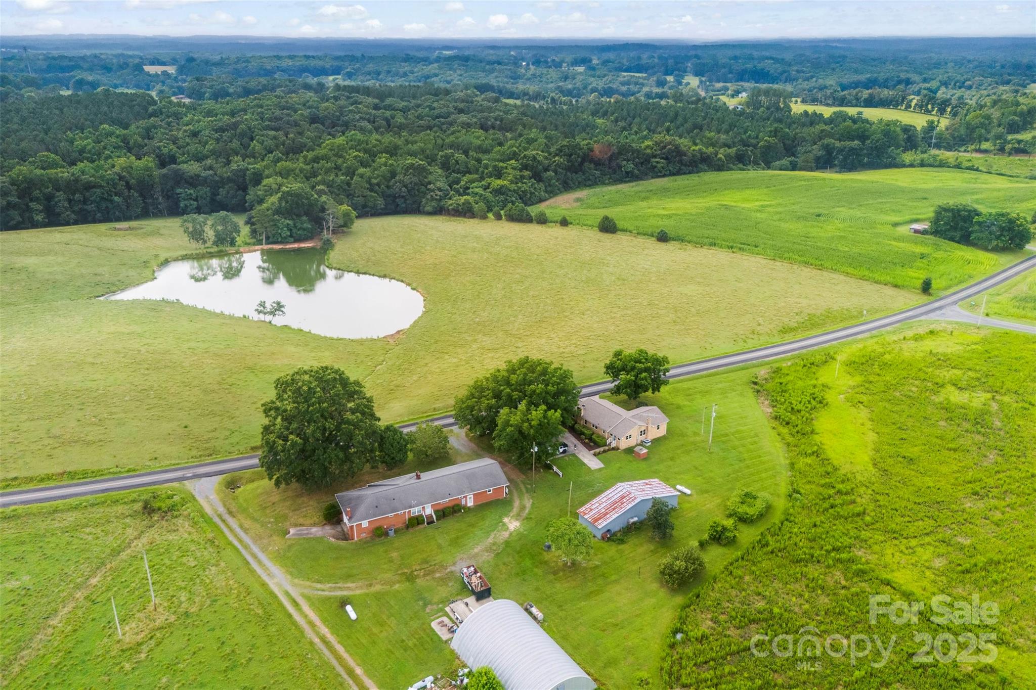 a view of a pool and an outdoor seating