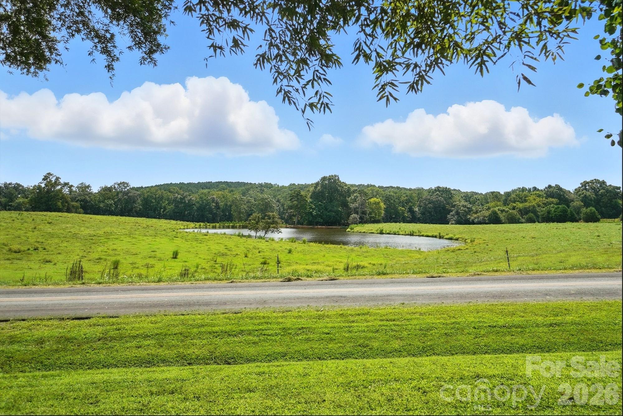 a view of a golf course with a lake