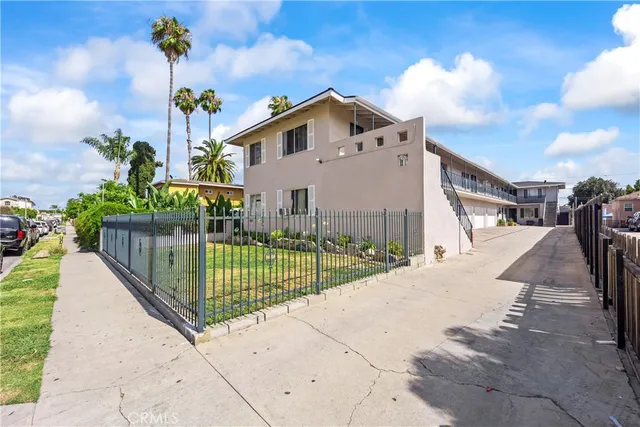a view of a street with brick building in front of it