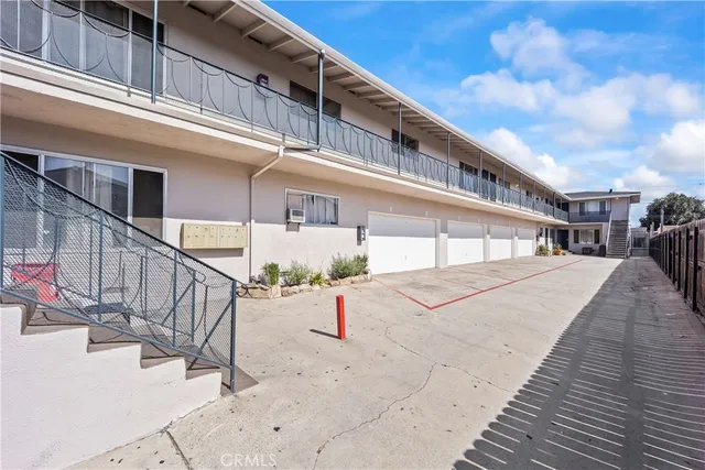 a view of a house with wooden stairs
