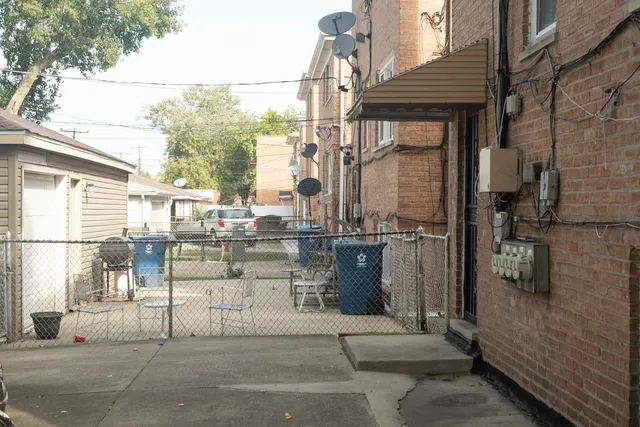 a side view of a house with a large window