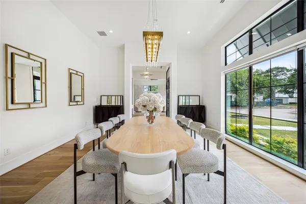 a living room with furniture ceiling fan and a rug