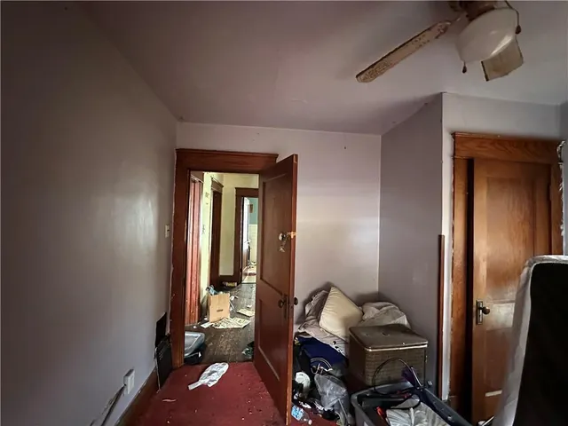 a room with furniture and gym equipment