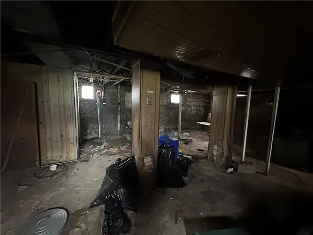 a living room with patio furniture