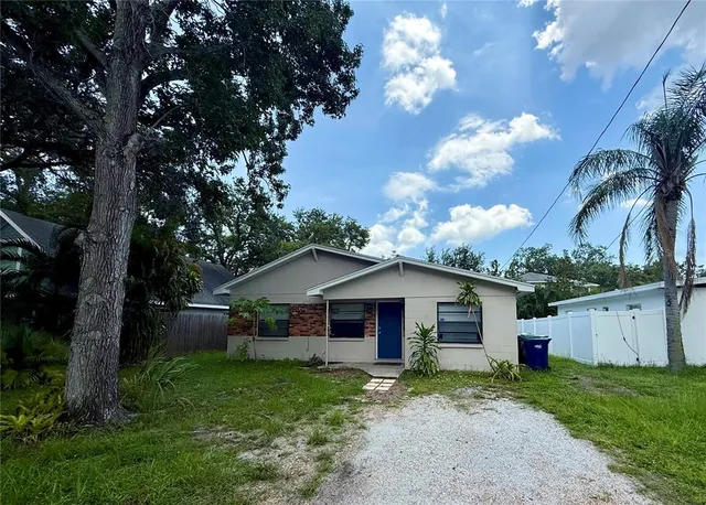 a kitchen with a refrigerator stove and microwave