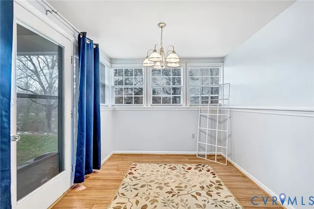a view of a bedroom with windows