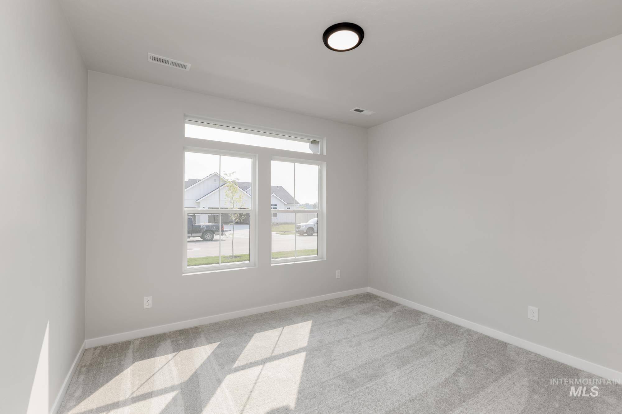5315 Castleton Avenue Nampa, ID 83686 - Photo 11 of 19 Spare room with light carpet
