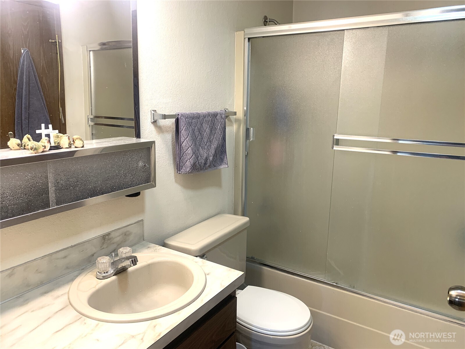 416 Meade Avenue Sumner, WA 98390 - Photo 14 of 39 a bathroom with a sink toilet and shower