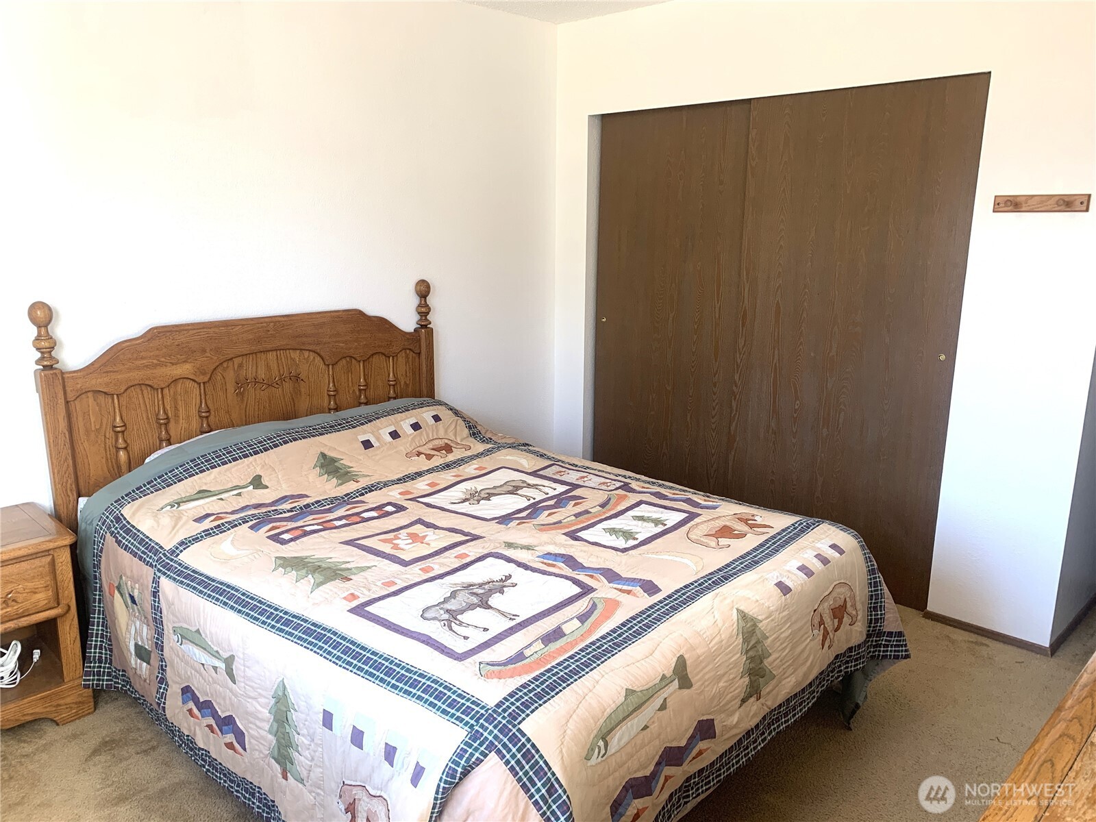 416 Meade Avenue Sumner, WA 98390 - Photo 17 of 39 a bedroom with a bed and a dresser