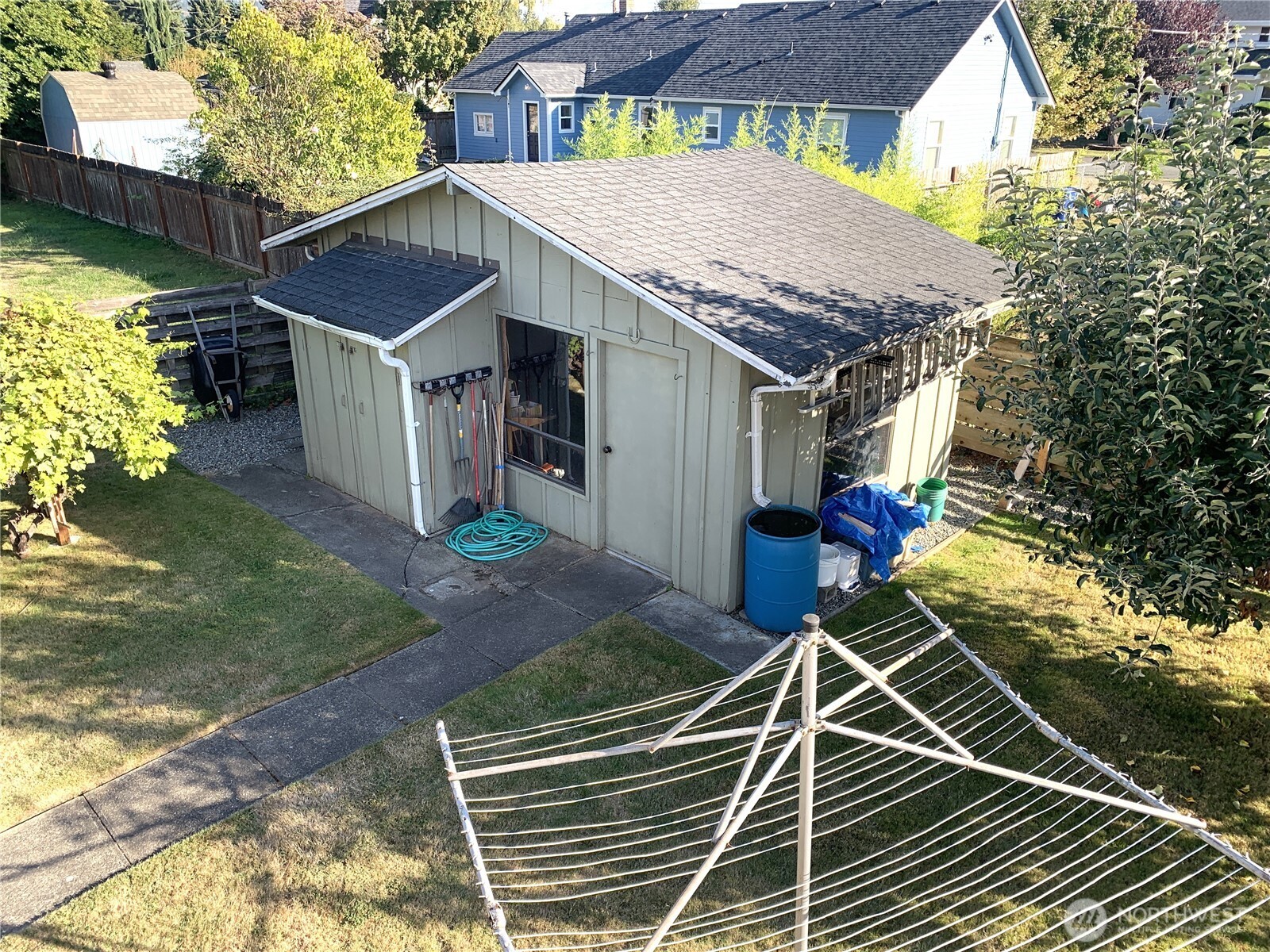 416 Meade Avenue Sumner, WA 98390 - Photo 26 of 39 a view of a house with a wooden deck