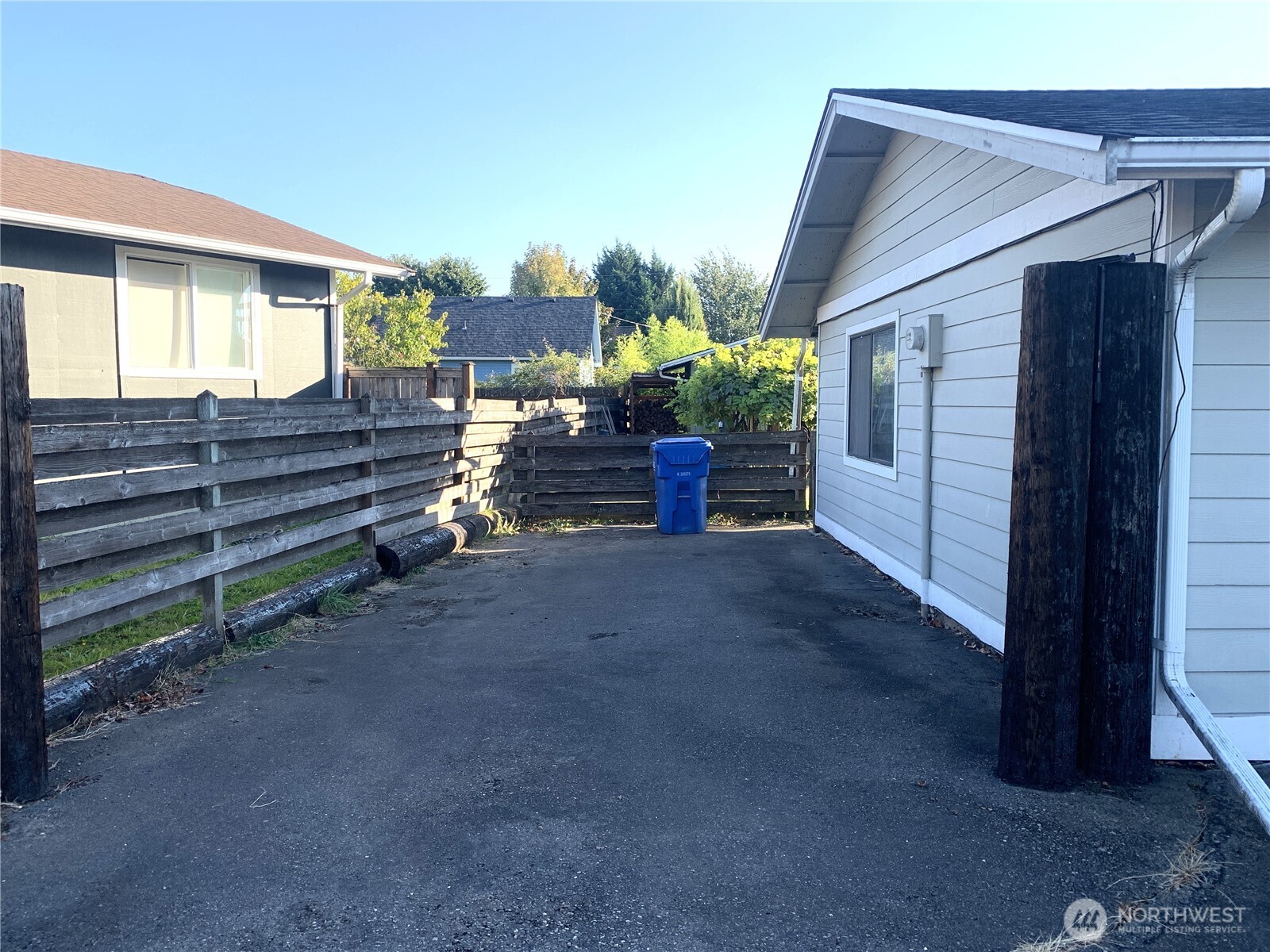 416 Meade Avenue Sumner, WA 98390 - Photo 32 of 39 a view of a house with backyard and sitting area