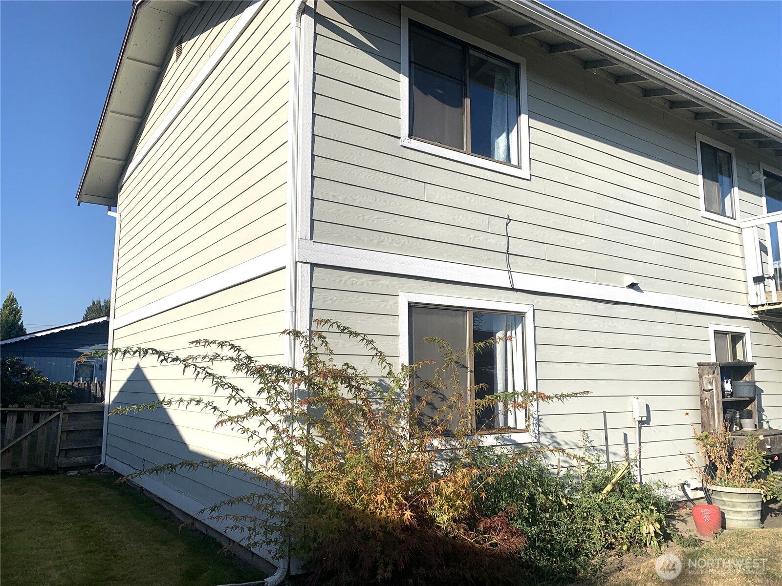 416 Meade Avenue Sumner, WA 98390 - Photo 33 of 39 a view of a house with a yard