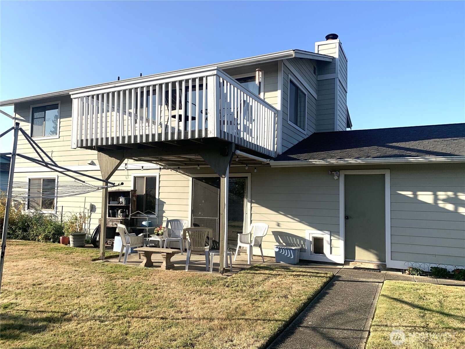 416 Meade Avenue Sumner, WA 98390 - Photo 34 of 39 a view of a house with wooden deck