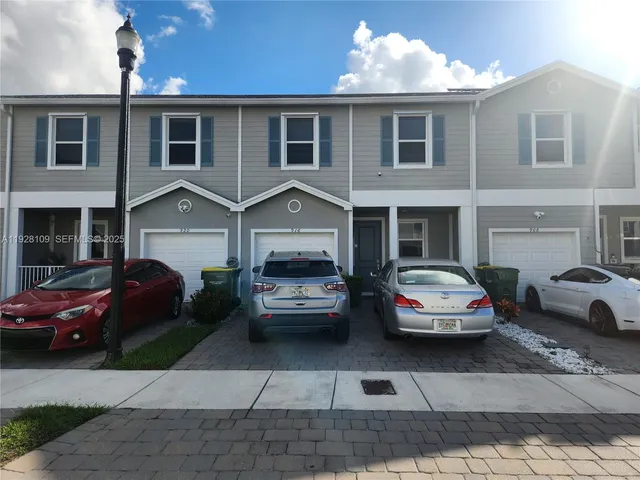 a car parked in front of a house