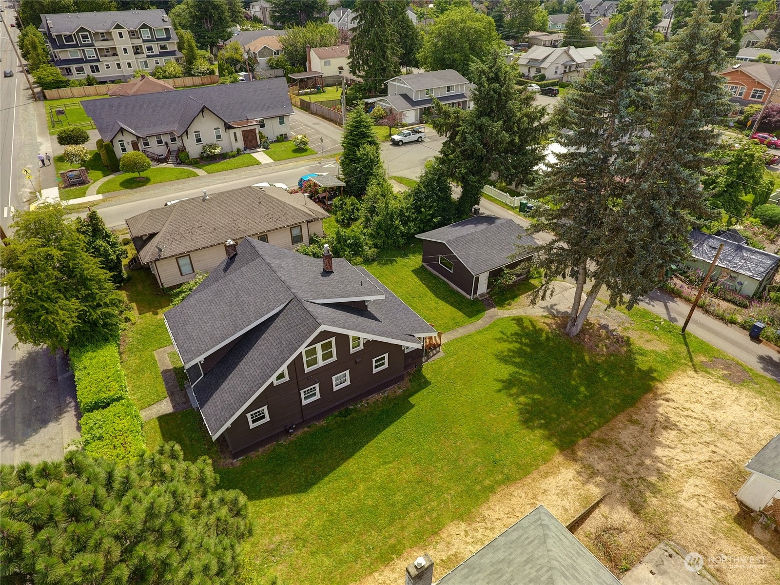375 East Sunset Way Issaquah, WA 98027 - Photo 6 of 26 an aerial view of a house with garden space and street view