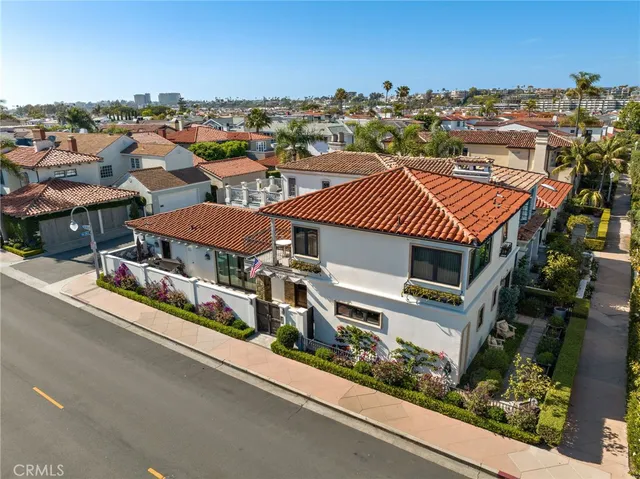 a view of a city street with tall buildings