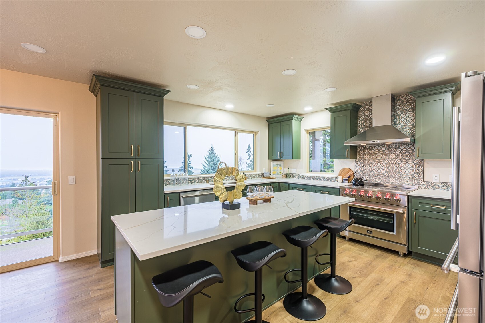 315 Quails Roost Road Sequim, WA 98382 - Photo 11 of 34 a kitchen with a sink appliances and wooden floor