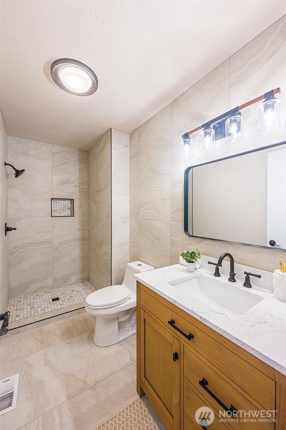 315 Quails Roost Road Sequim, WA 98382 - Photo 18 of 34 a bathroom with a double vanity sink toilet and shower