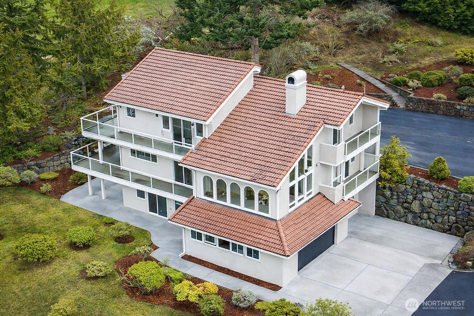 315 Quails Roost Road Sequim, WA 98382 - Photo 2 of 34 a view of a house with a yard and wooden deck