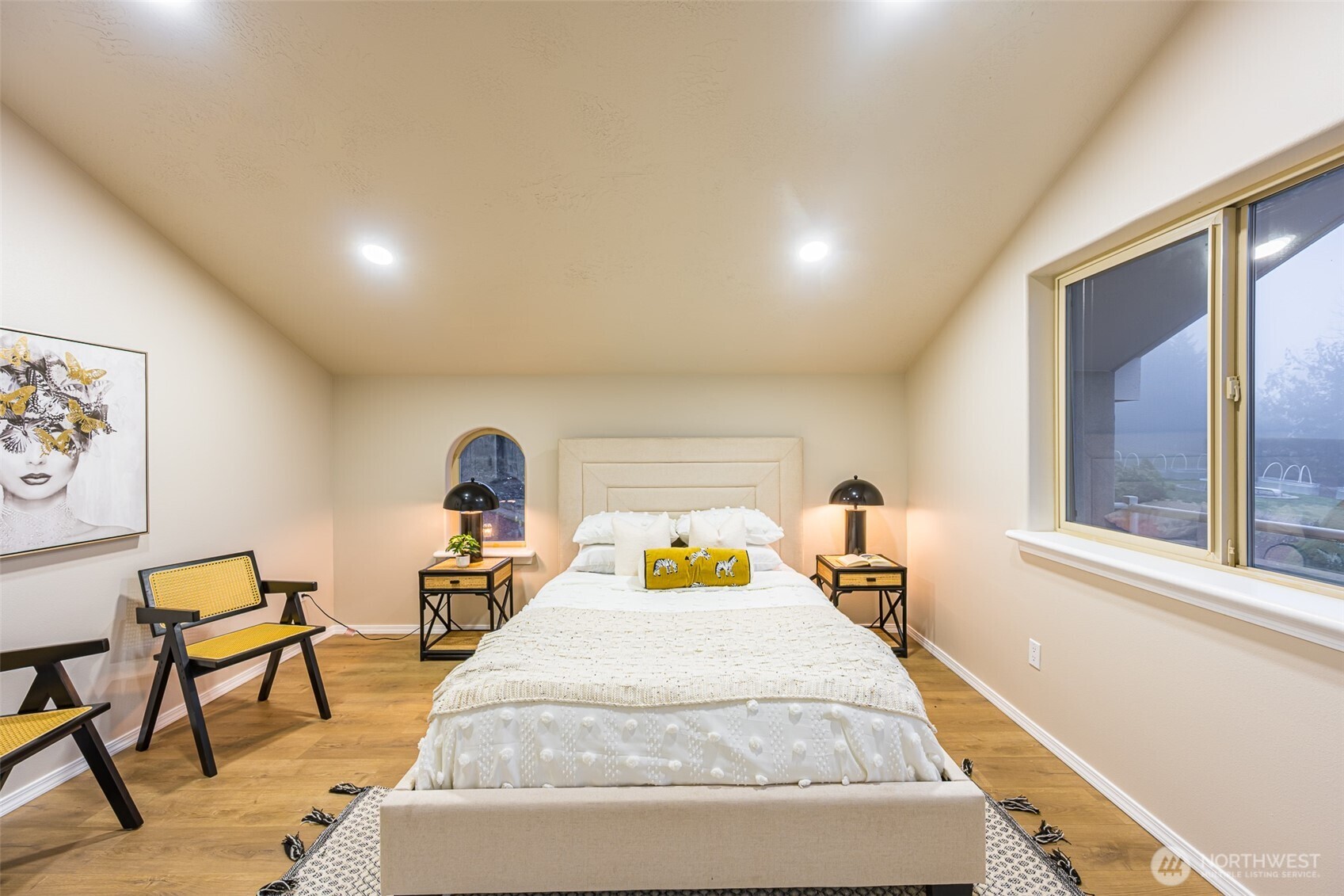 315 Quails Roost Road Sequim, WA 98382 - Photo 26 of 34 a bedroom with a bed and a large window