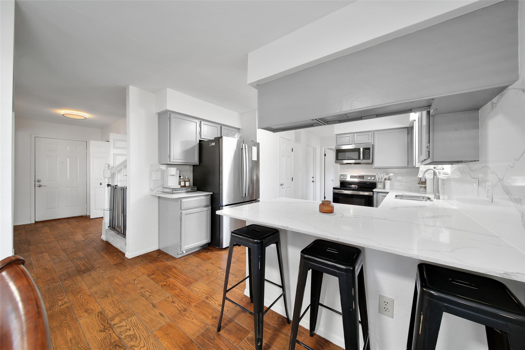 4206 Pineville Lane Spring, TX 77388 - Photo 17 of 35 a kitchen with refrigerator cabinets and furniture