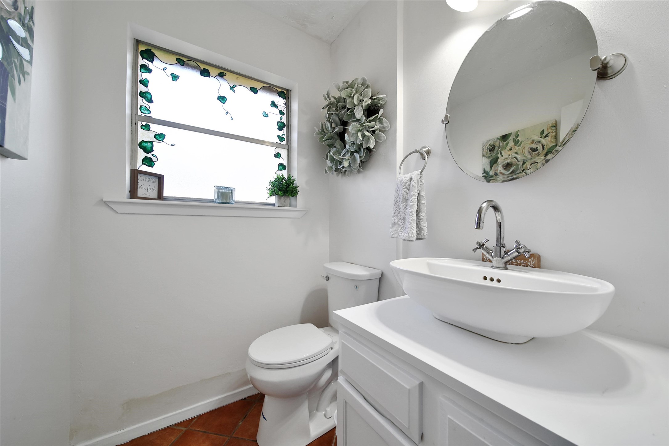 4206 Pineville Lane Spring, TX 77388 - Photo 20 of 35 a bathroom with a toilet sink and mirror