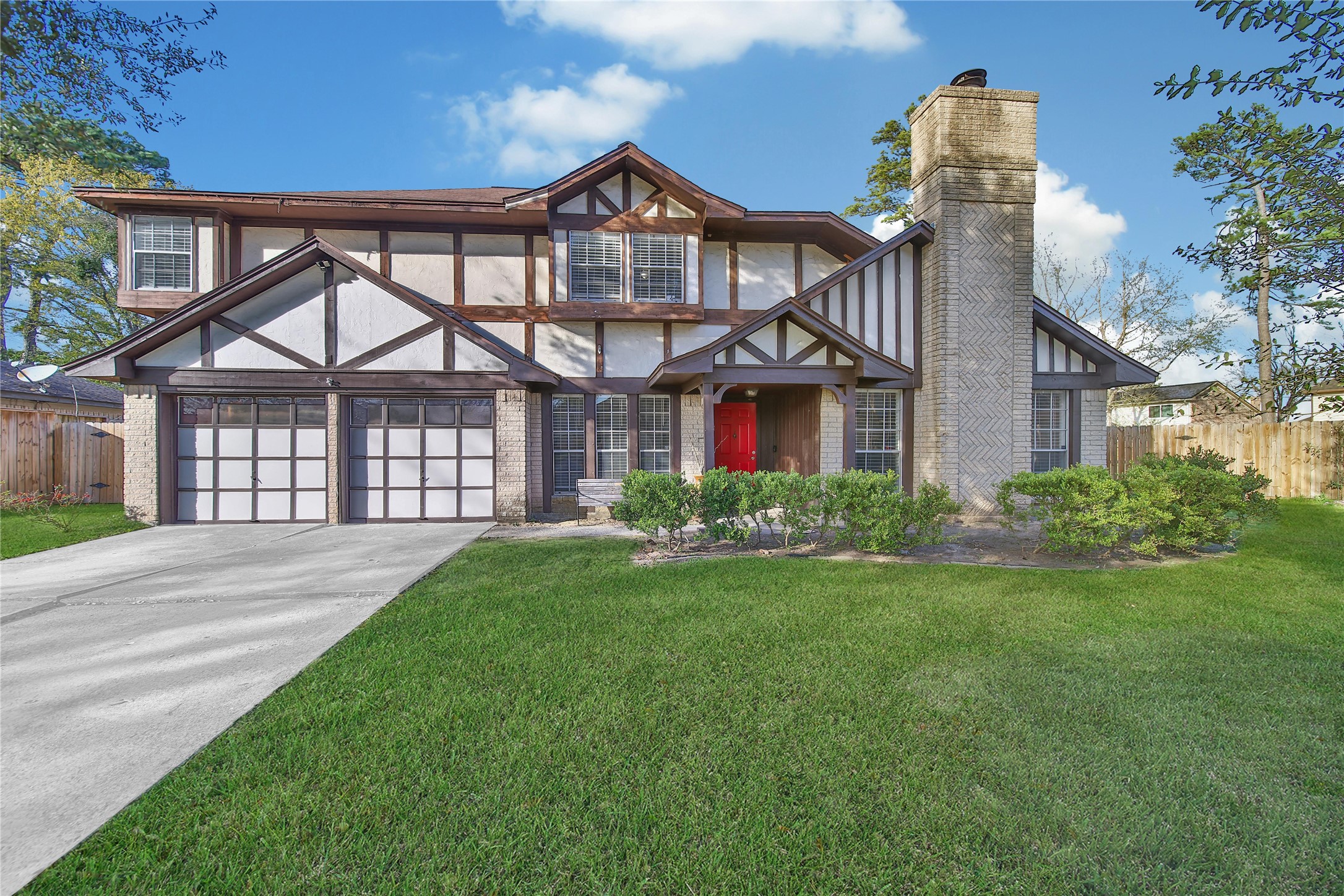 4206 Pineville Lane Spring, TX 77388 - Photo 32 of 35 a front view of a house with a yard and porch