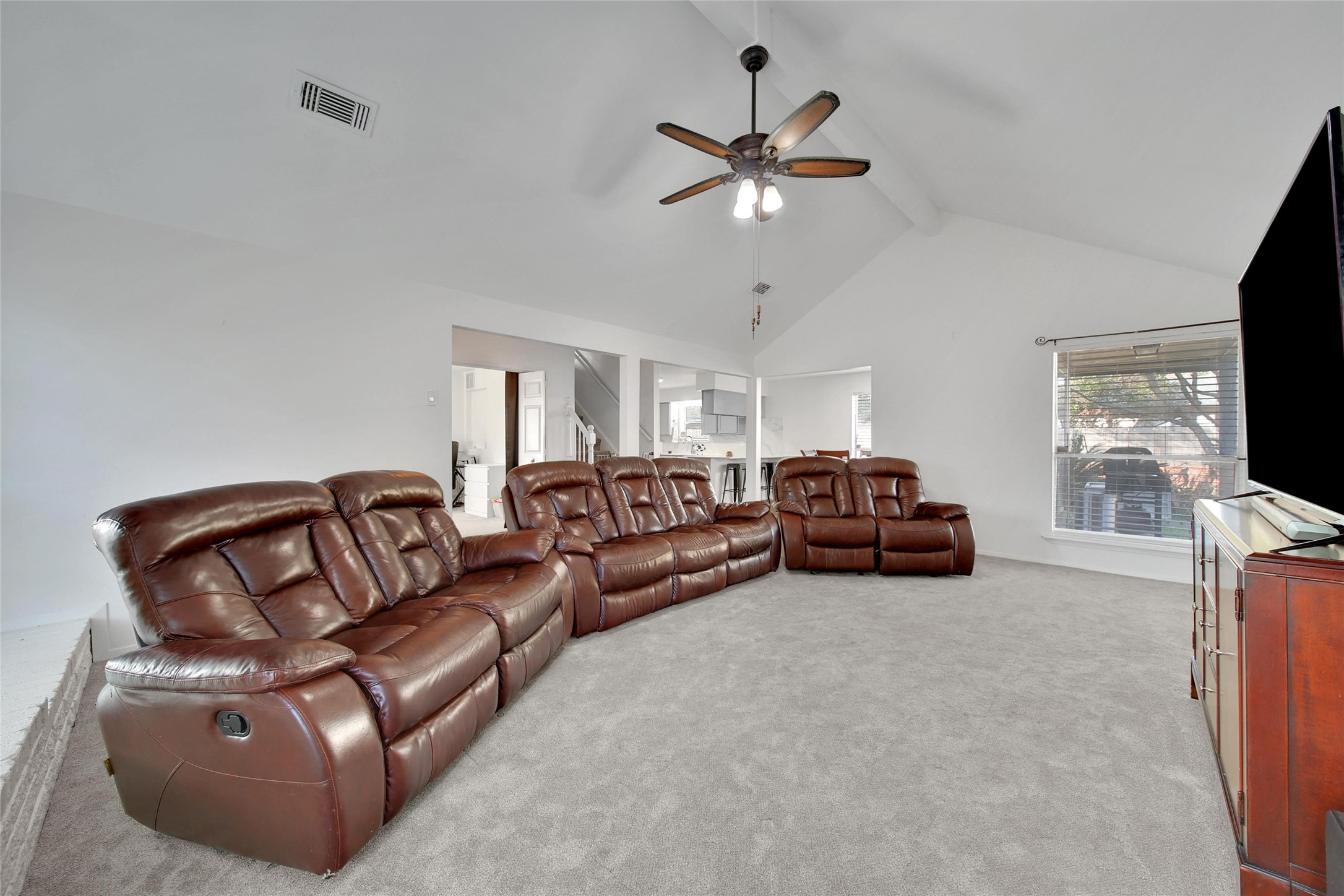 4206 Pineville Lane Spring, TX 77388 - Photo 9 of 35 a living room with furniture and a flat screen tv