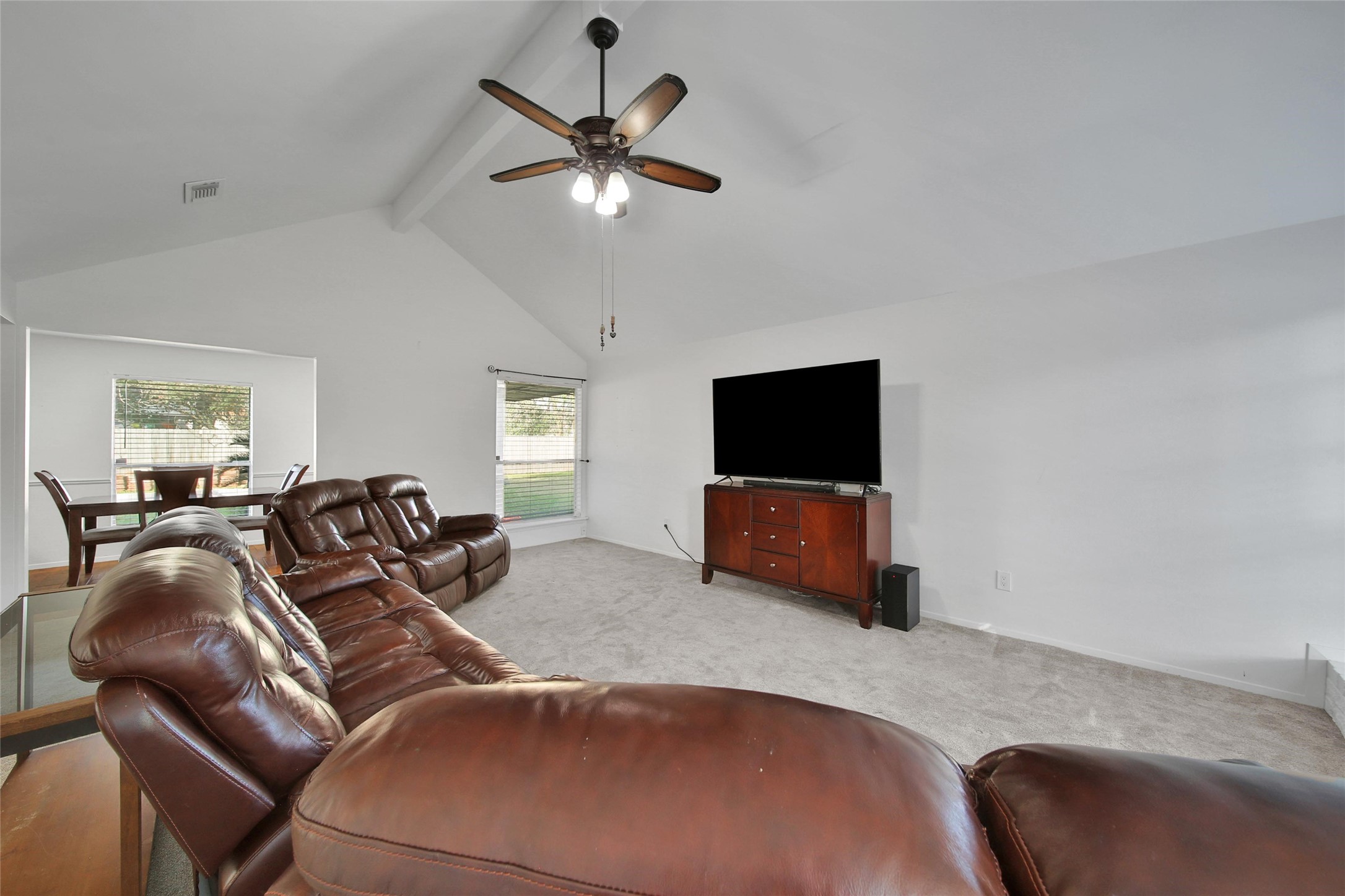 4206 Pineville Lane Spring, TX 77388 - Photo 10 of 35 a living room with furniture and a flat screen tv