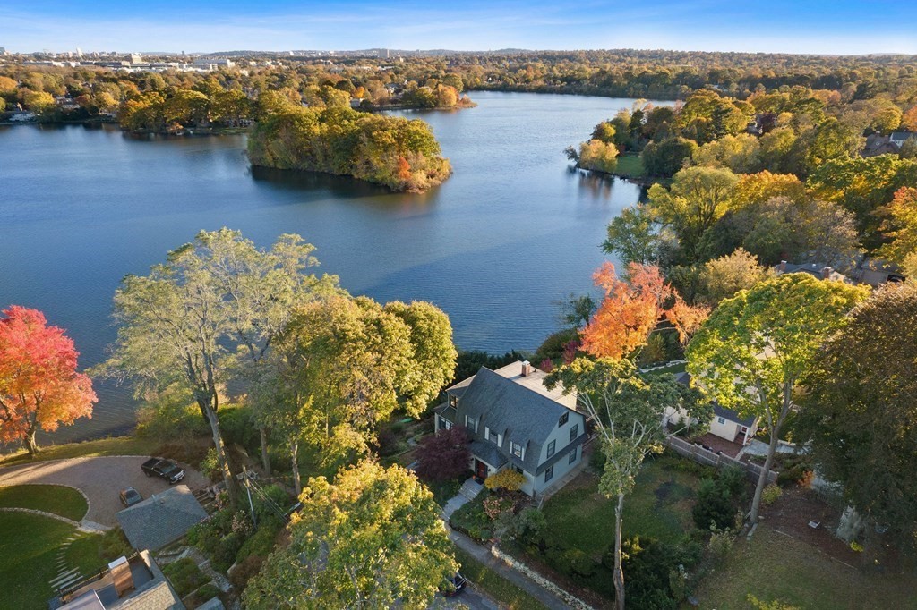 an aerial view of lake residential house with outdoor space
