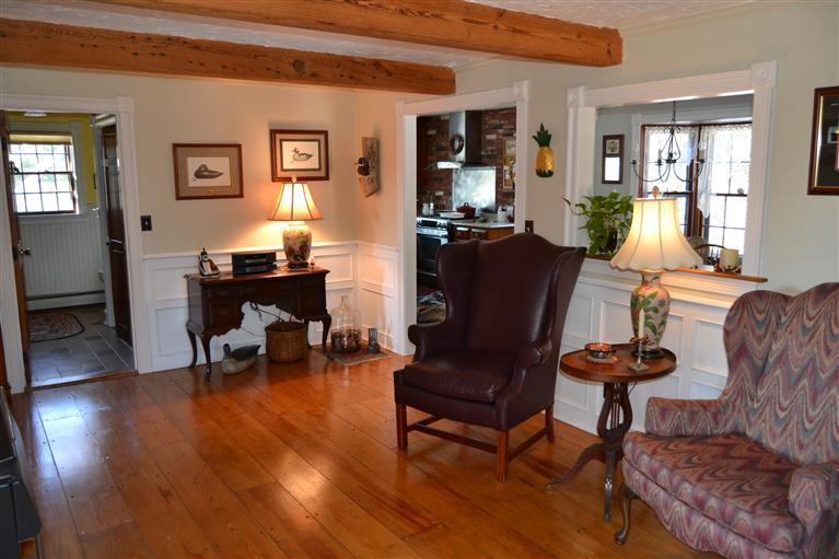 127 Point Hill Road West Barnstable, MA 02668 - Photo 12 of 29 a living room with furniture and a wooden floor
