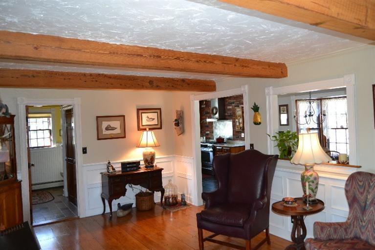 127 Point Hill Road West Barnstable, MA 02668 - Photo 26 of 29 a view of a dining room with furniture and wooden floor
