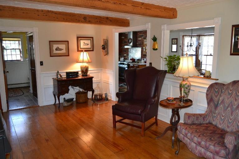 127 Point Hill Road West Barnstable, MA 02668 - Photo 27 of 29 a living room with furniture and a wooden floor