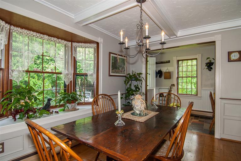 127 Point Hill Road West Barnstable, MA 02668 - Photo 8 of 29 a view of a dining room with furniture window and wooden floor