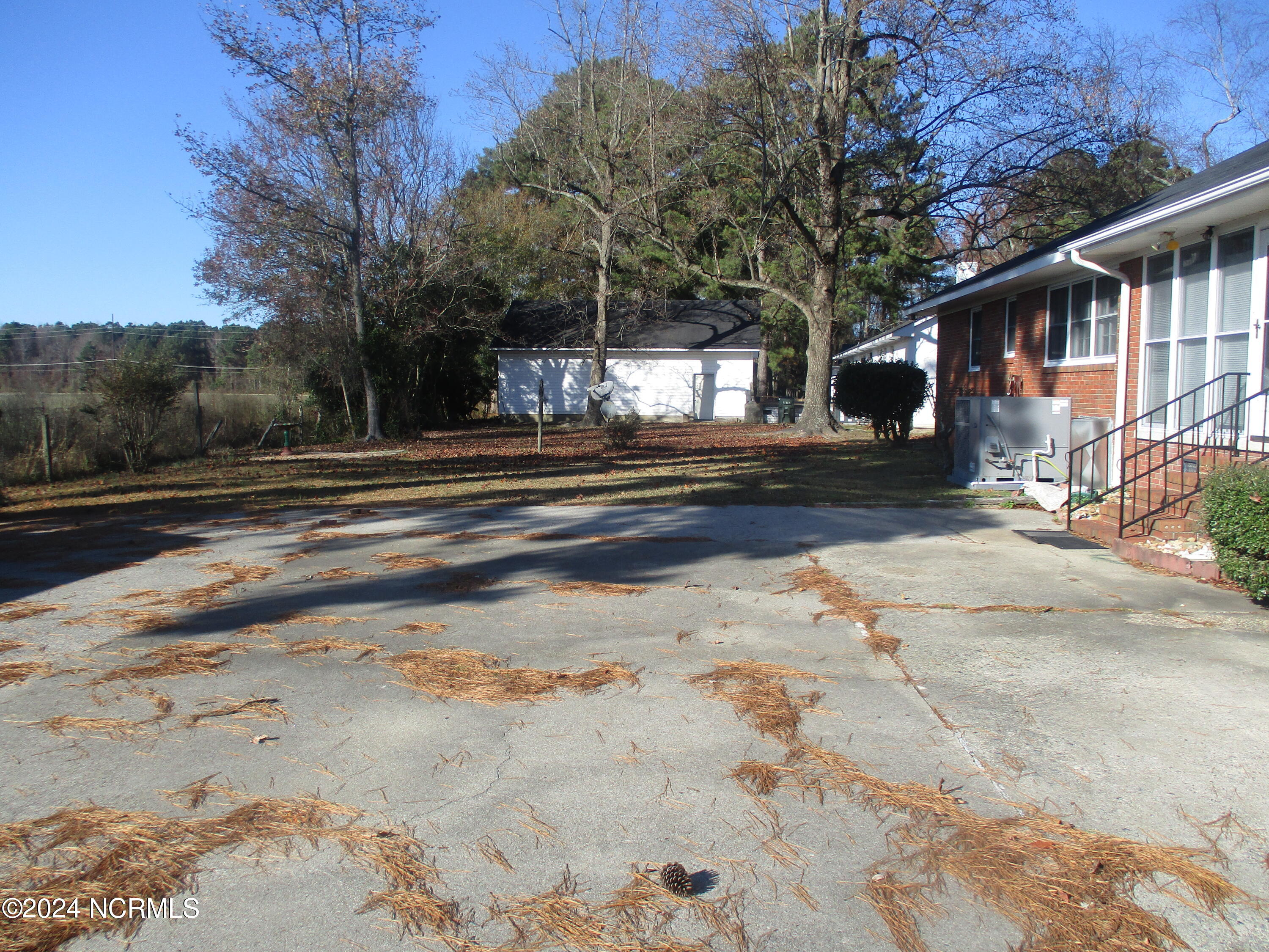 1708 Hardee Road Kinston, NC 28504 - Photo 33 of 34 Back of house paved driveway