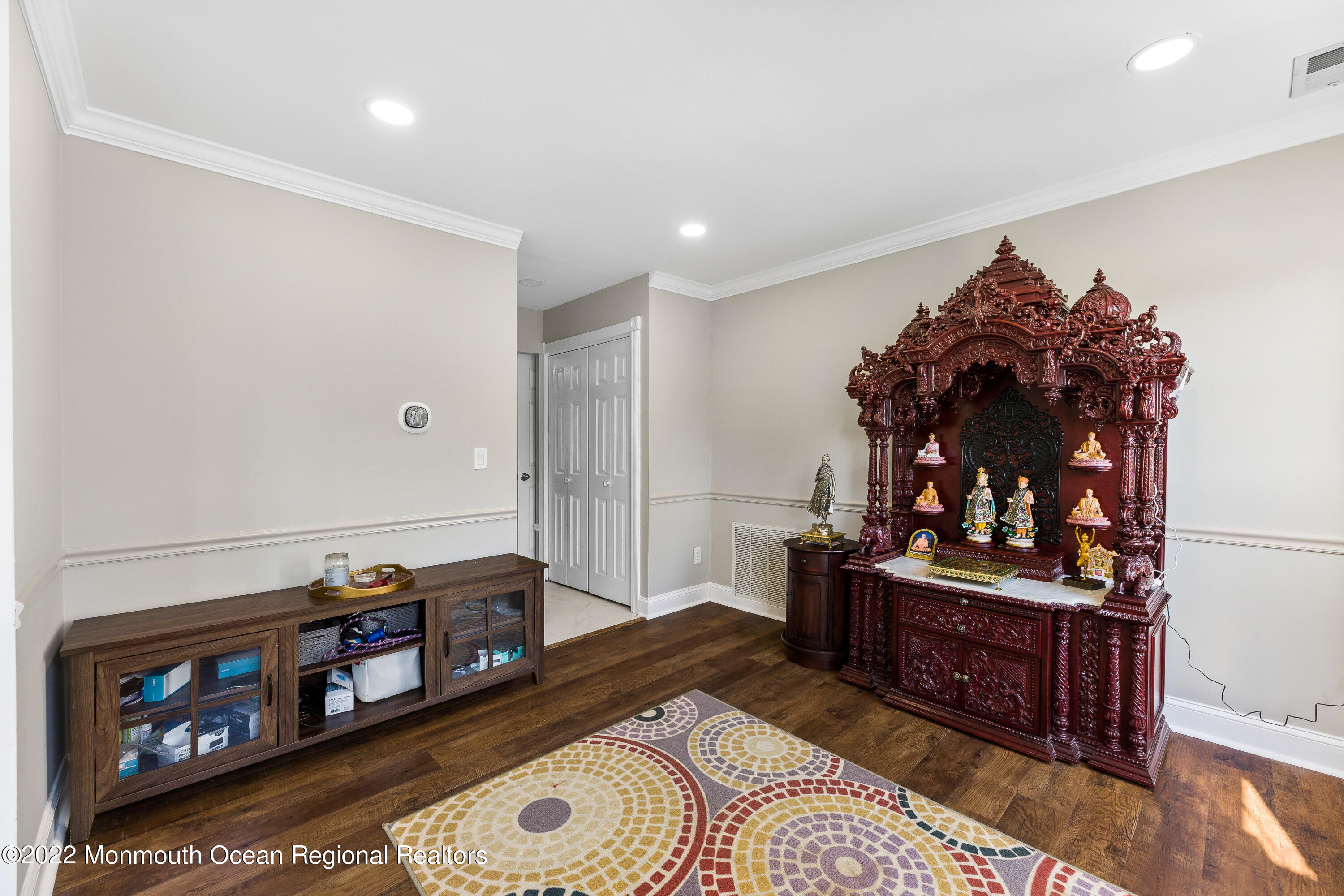 10 Reed Road Howell, NJ 07731 - Photo 11 of 32 a living room with furniture and a wooden floor