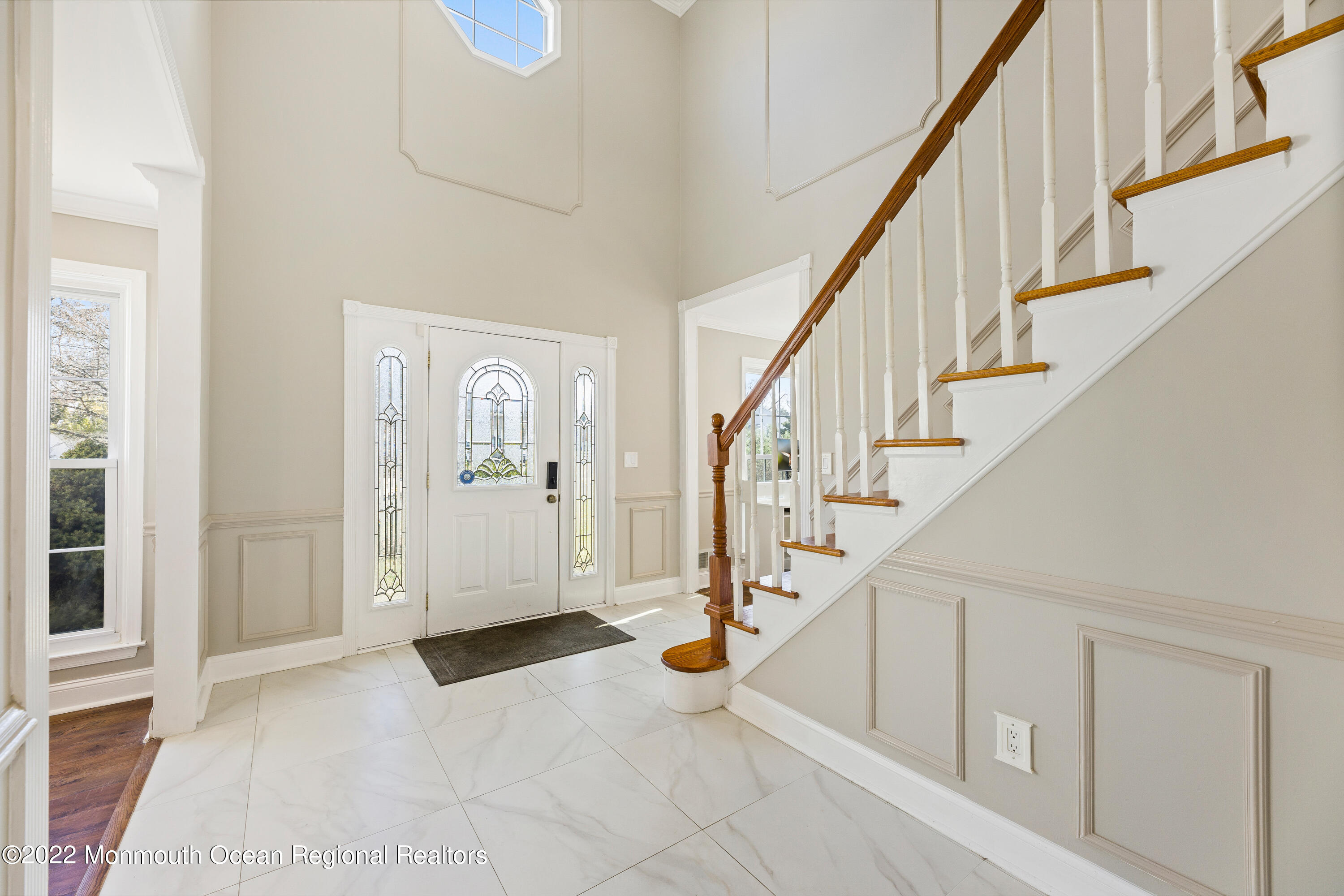 10 Reed Road Howell, NJ 07731 - Photo 8 of 32 a view of entryway and hall with wooden floor